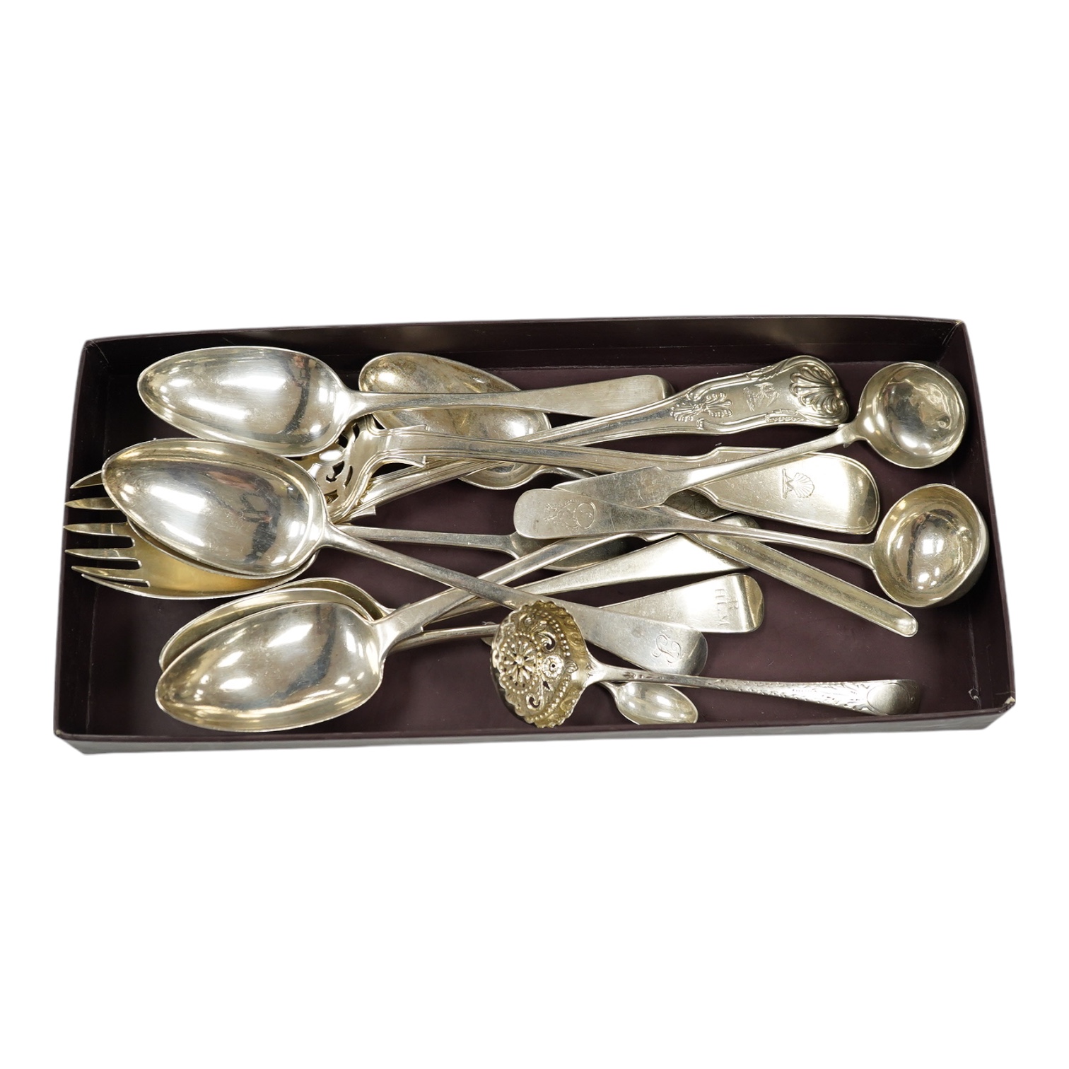 Thirteen items of mainly 19th century silver flatware including servers, sifter spoon, toddy ladles, spoon/marrow scoop, etc. various dates and makers, 28.7oz. Condition - fair